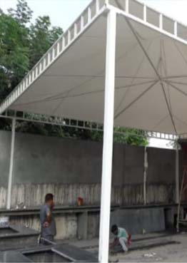 Shed-style roofing structure installation for a covered walkway